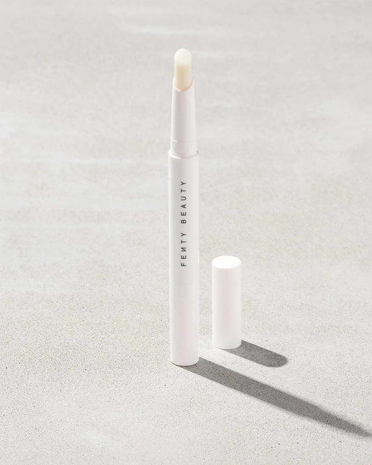 Brow MVP Sculpting Wax Pencil standing upright with the cap off and the brow wax twisted up.