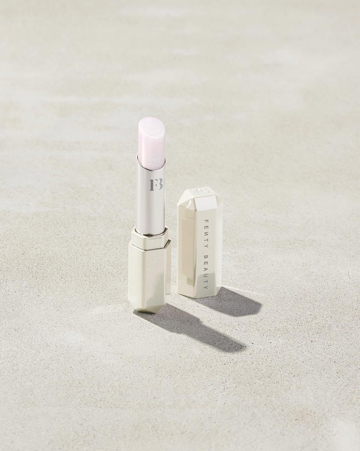 Slip Shine Sheer Shiny Lipstick shown in shade Quartz Candy
